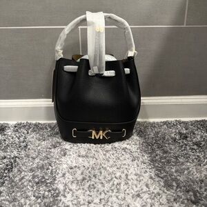 Michael Kors Black Pebbled Leather Drawstring Bucket Bag with Gold MK Accent